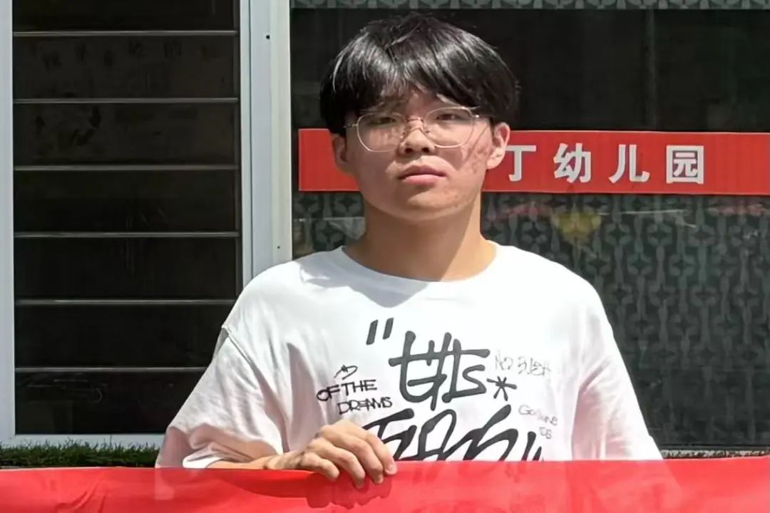 12E77